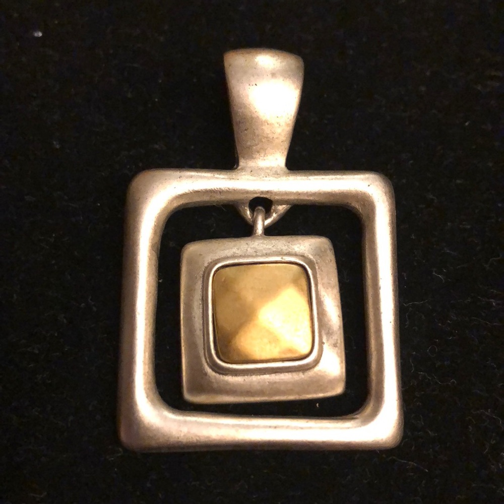 Retired Premier Design gold and silver pendant